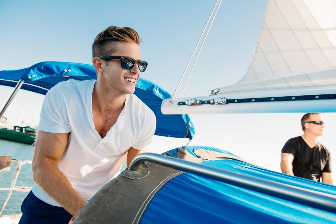 Young man sailing boats - BRC